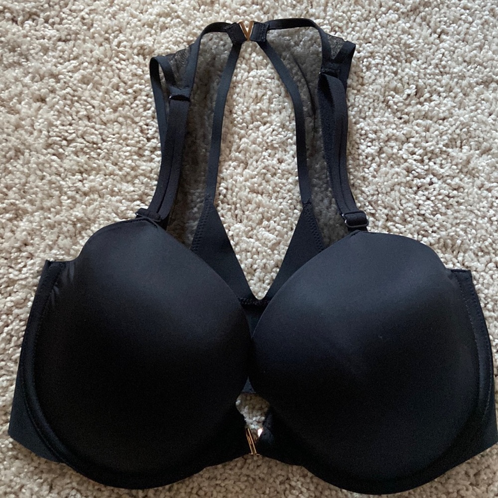 Victoria secret lines Demi 34DDD. Black with gold detail. Sheer back straps.